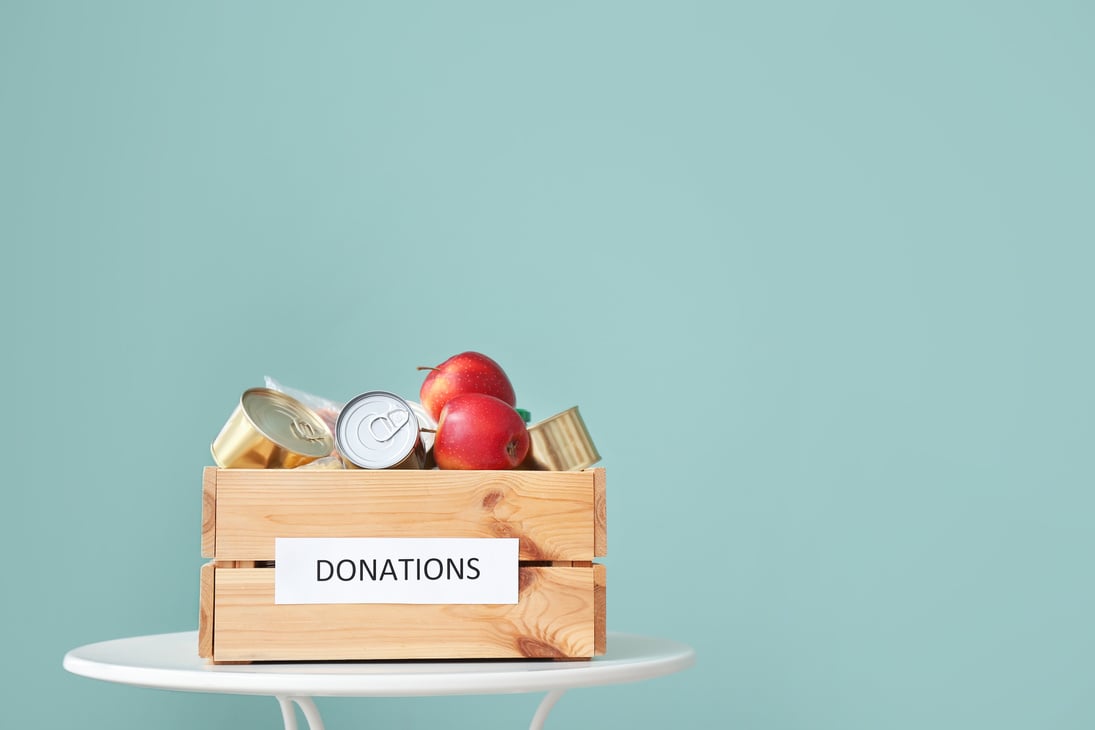 Box with Donations on Table